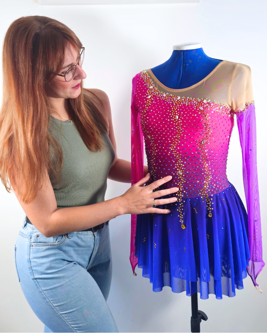 custom pink  figure skating dress with rhinestones by Sleek Edge