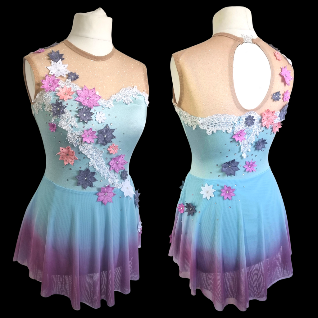 custom blue figure skating dress with flowers by Sleek Edge